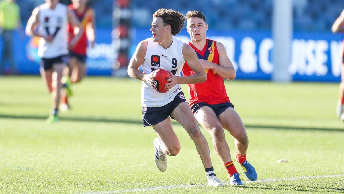 Isaac Wareham marks the ball while playing football for Victoria Country. Picture: Morgan Hancock