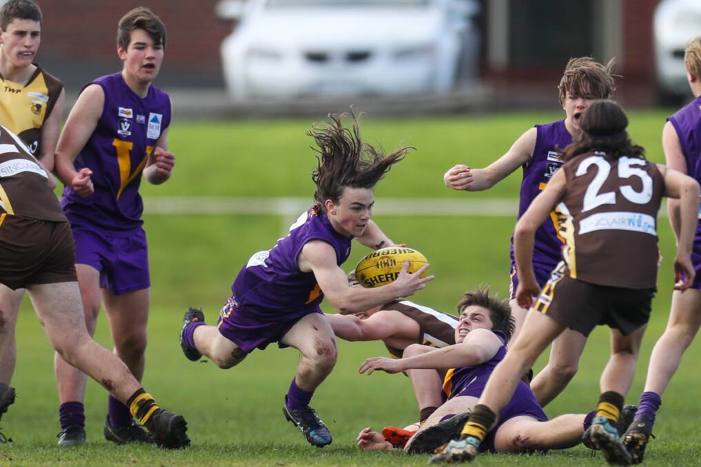 REST UP: Port Fairy's Archer Lay plays Hampden under 14 football. The July bye gave families with children playing football each week a chance to get away. Picture: Morgan Hancock