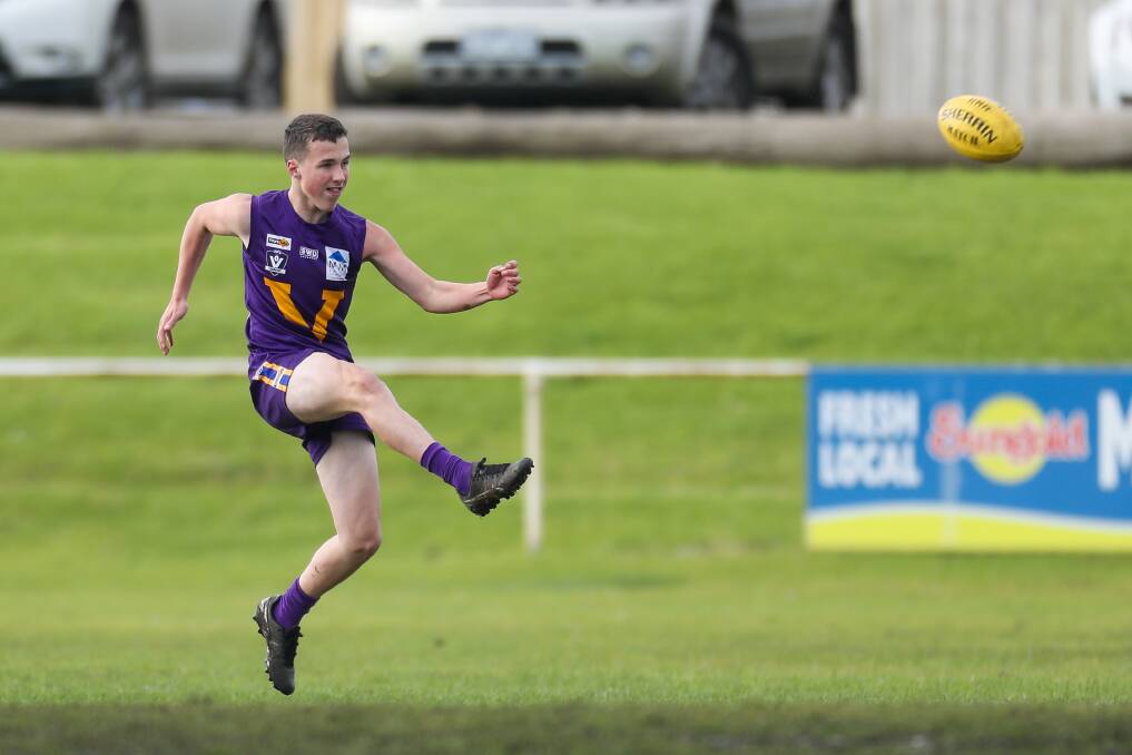 FIELD OF DREAMS: Port Fairy's Cooper Fraser gets a kick away during a Hampden league under 16 match in 2019. Picture: Morgan Hancock