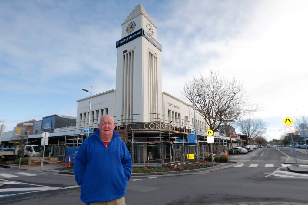 History revealed: Warrnambool resident Graham Kelly stands out the front of the T&G Corner which has been hidden by newer signage for decades. Picture: Mark Witte