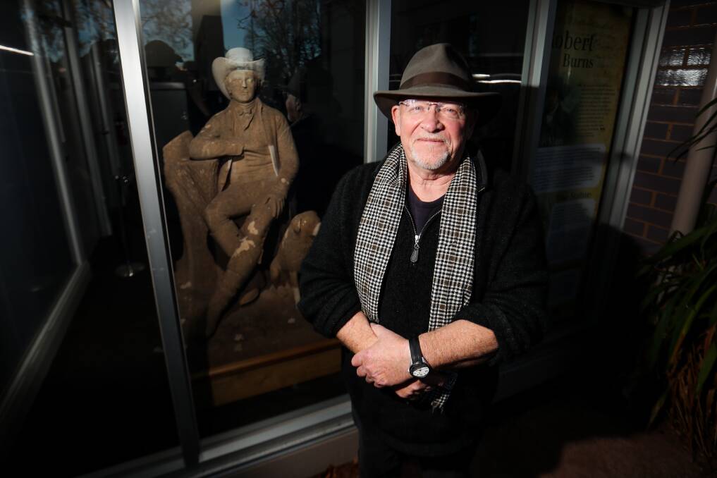 Festival: Eric Bogle poses next to the Robert Burns statue after performing at the 2019 event. Picture: Morgan Hancock
