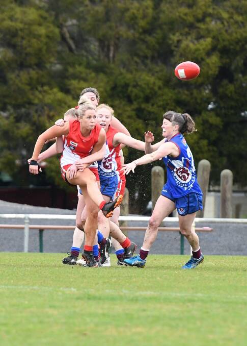 FORWARD FORAY: South Warrnambool's Meg Lumsden gets a quick kick away against Horsham Demons on Sunday. Picture: Jade Bate