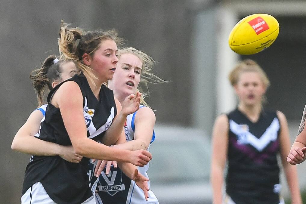 STEPPING UP: Warrnambool's Molly O'Brien, pictured playing for the Deakin University Female Football League representative side last week, has given up netball to concentrate on football. Picture: Morgan Hancock