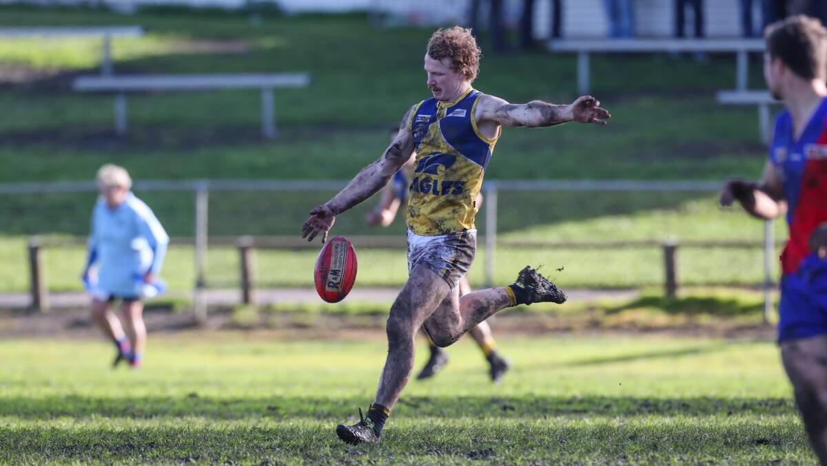 ON THE MOVE: North Warrnambool's Luke Wines drives the ball long. He kicked one goal in his side's 65-point win over Terang Mortlake on Saturday. Picture: Rob Gunstone