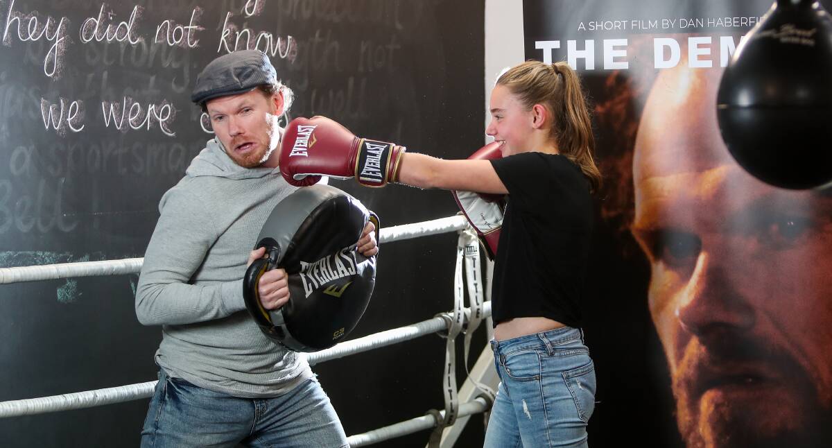 In for a fight: Film maker Dan Haberfield trains in the boxing ring alongside his niece Dayna Haberfield, 13. Picture: Morgan Hancock