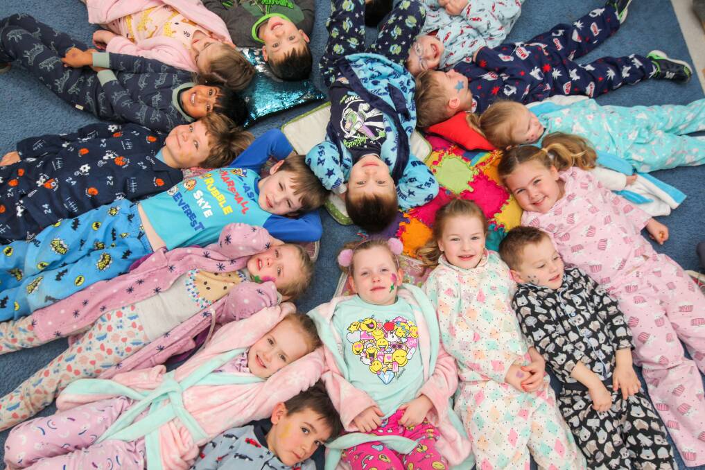Comfy: Kindergarten kids from Koala Childcare Centre are ready for bed and the National Pyjama Day. Picture: Rob Gunstone