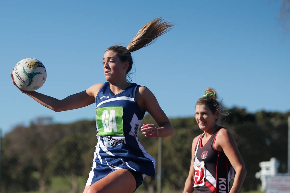 HAIR-RAISING: Warrnambool's Amy Wormald catches the ball in windy conditions on Saturday. Picture: Mark Witte
