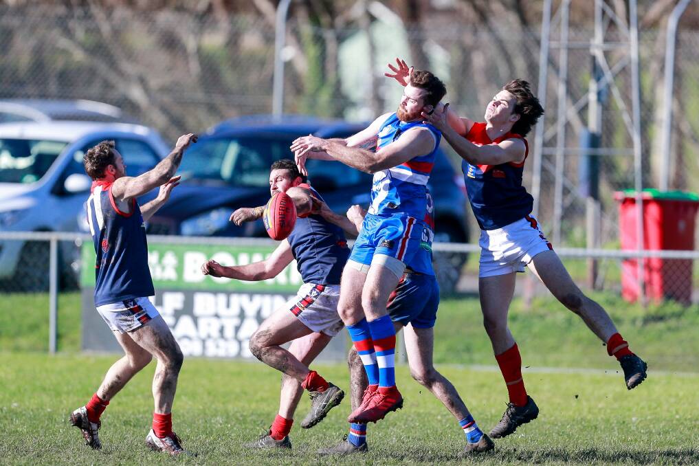 Pack: Panmure's Tom White flies for a mark. Picture: Anthony Brady