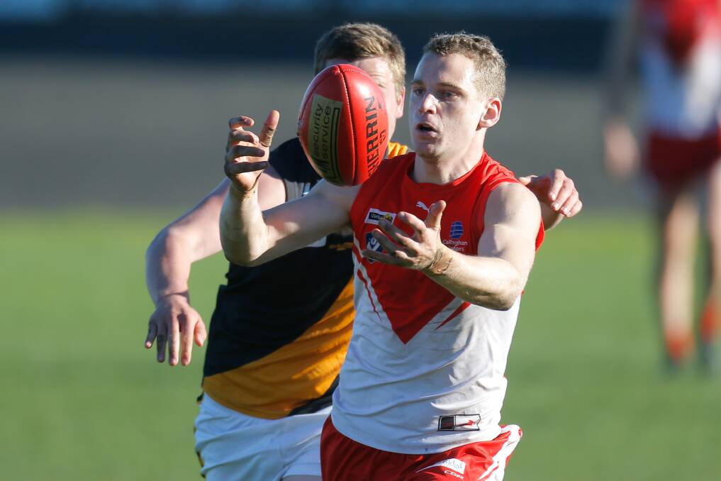 SAFE HANDS: South Warrnambool's Hugh Clancey prepares to mark against Portland. Picture: Mark Witte