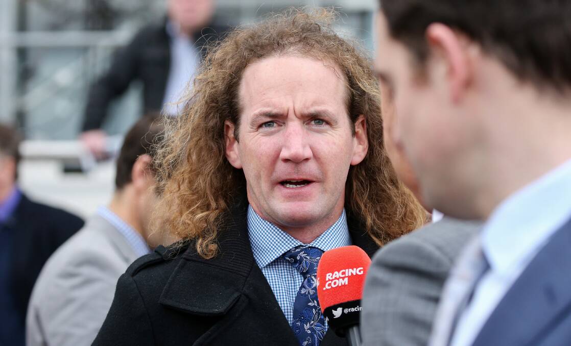Trainer Ciaron Maher is seen after jockey Mark Zahra rode Sopressa to victory in race 4, Danny Barrett VOBIS Gold Stayers during the Bletchingly Stakes Day at Caulfield Racecourse in Melbourne, Saturday, July 27, 2019. (AAP Image/George Salpigtidis)