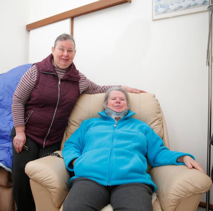 LUCKY: Shirley Drake (right) is recovering at her sister Janet's Warrnambool home after a haybale fell on her earlier this month. Picture: Mark Witte