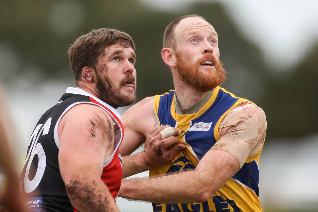 TALL TIMBER: Koroit's Rhys Raymond and North Warrnambool's Jordan Dillon compete in the ruck earlier this season. Picture: Morgan Hancock