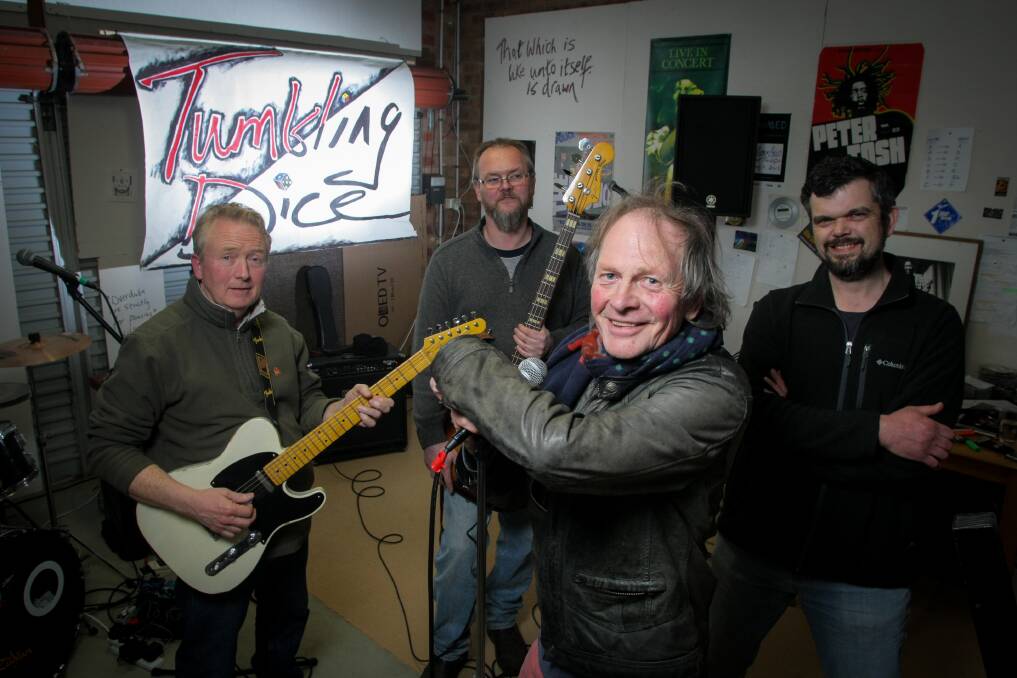 Flash Jumping: Rolling Stones cover band Tumbling Dice, l-r guitarist Phil Jones, bass player Tim Conlan, singer Richard Crawley and keyboard player Mark Walravens rehearse for their Spirit of the Stones gig in Port Fairy on Saturday. Picture: Rob Gunstone