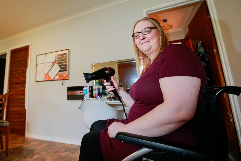 INSPIRING: Warrnambool's Lisa Hartwich runs a hairdressing salon from her home. She says "being in a chair won't stop me from doing what I love". Picture: Anthony Brady