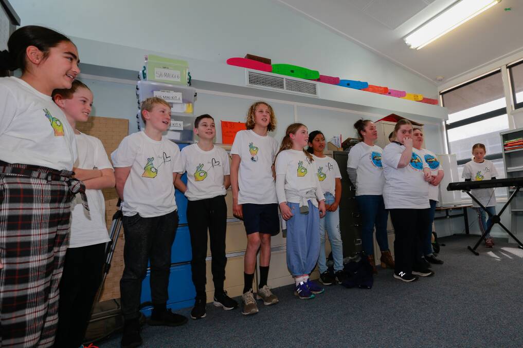 ALL TOGETHER NOW: Warrnambool East Primary School students sang a rendition of Vance Joy's 'Riptide' with members of the all-abilities choir. Picture: Anthony Brady