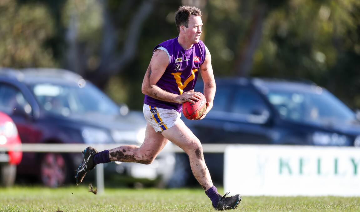 OPEN GRASS: Port Fairy's Colin Harwood was able to find plenty of space to run against the Eagles. Picture: Morgan Hancock