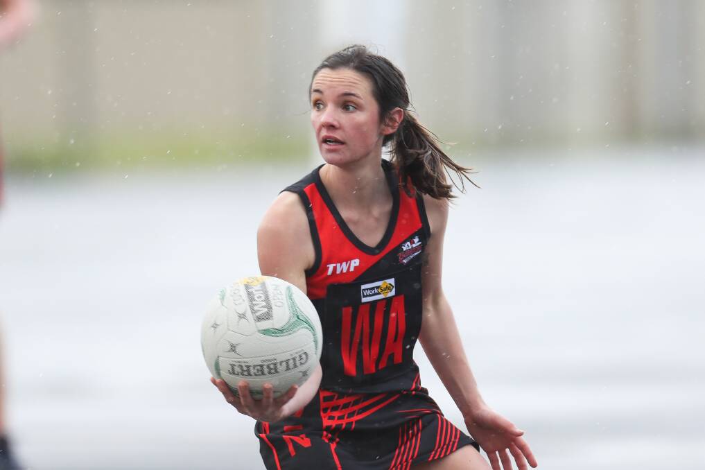 FLYING: Cobden's Amy Hammond was crowned the Hampden league's open netball best and fairest on Sunday. Picture: Morgan Hancock