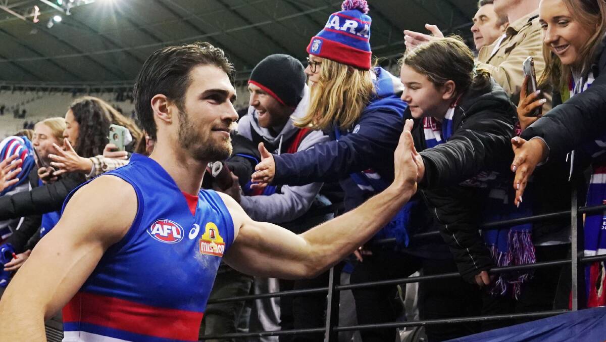 POSITIVE VIBES: Western Bulldogs coach Easton Wood can sense the energy in his young teammates. Picture: AAP Image/Michael Dodge