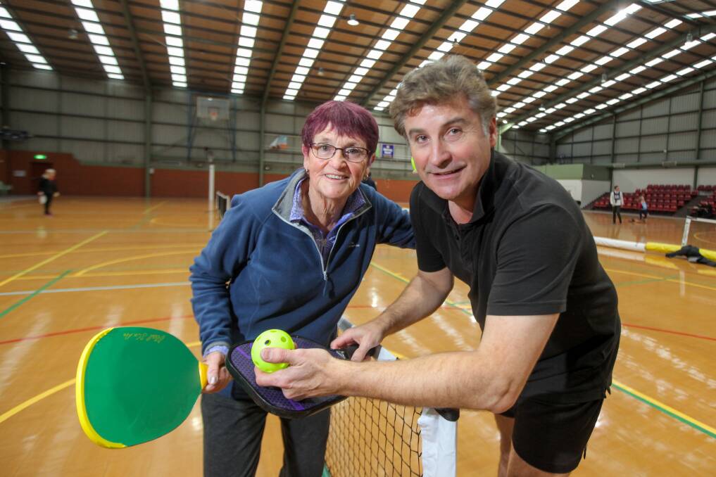 FUN GAME: Warrnambool Stadium's Val Bertrand and city council mayor Tony Herbert are encouraging people to have a go at pickleball, a mix between tennis, badminton and table tennis. Picture: Rob Gunstone