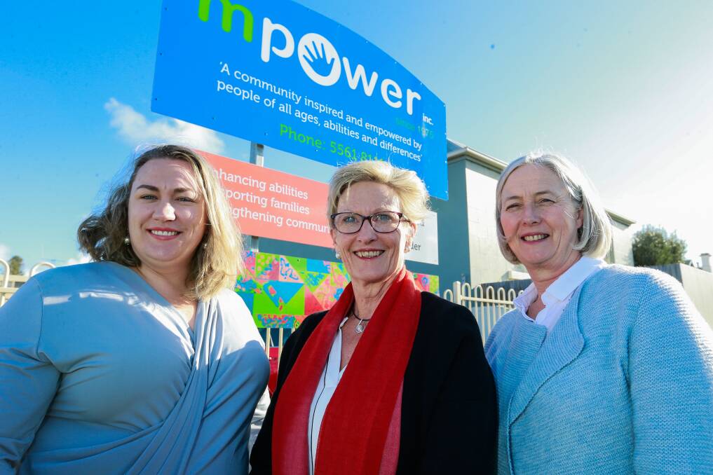Funding welcomed: MPOWER Warrnambool CEO Kerry Nelson (middle) and staff members Elizabeth Green and Louise Jellie celebrate federal government funding. Picture: Anthony Brady
