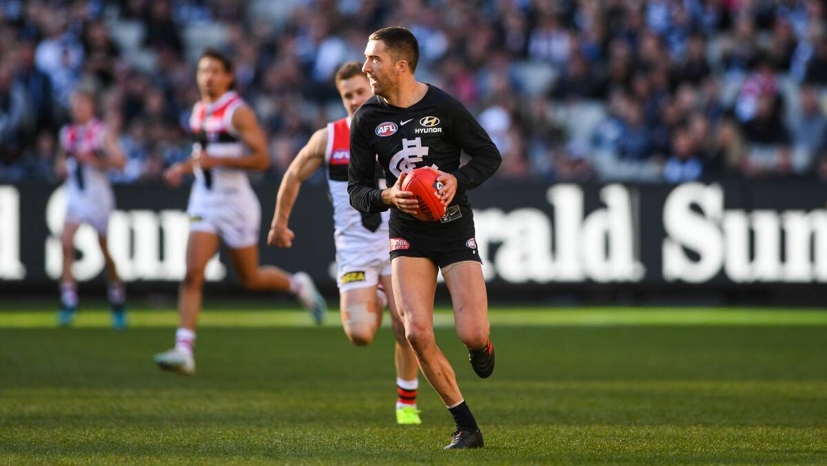 TAKING IT ON: Carlton's Kade Simpson, who announced his retirement today, has been one of many damaging attacking defenders in the AFL. Picture: Morgan Hancock