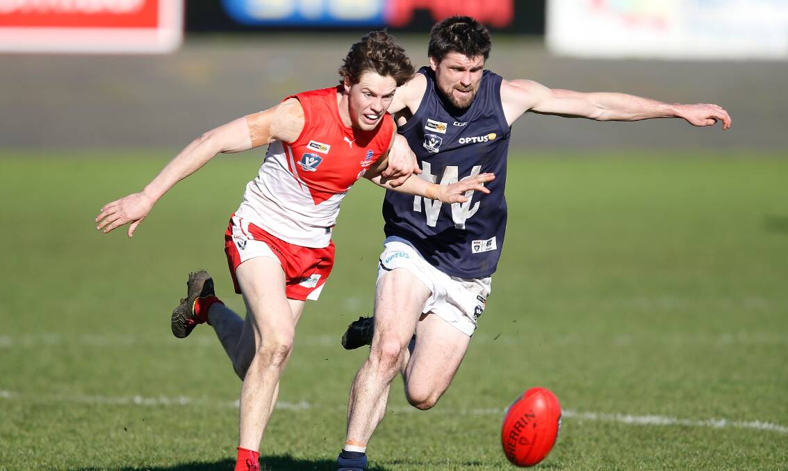 Worth fighting for: South Warrnambool's Jock Blair competes for the ball. Roosters' president Steve Harris wants to explore all options to make a football/netball season possible. Picture: Mark Witte