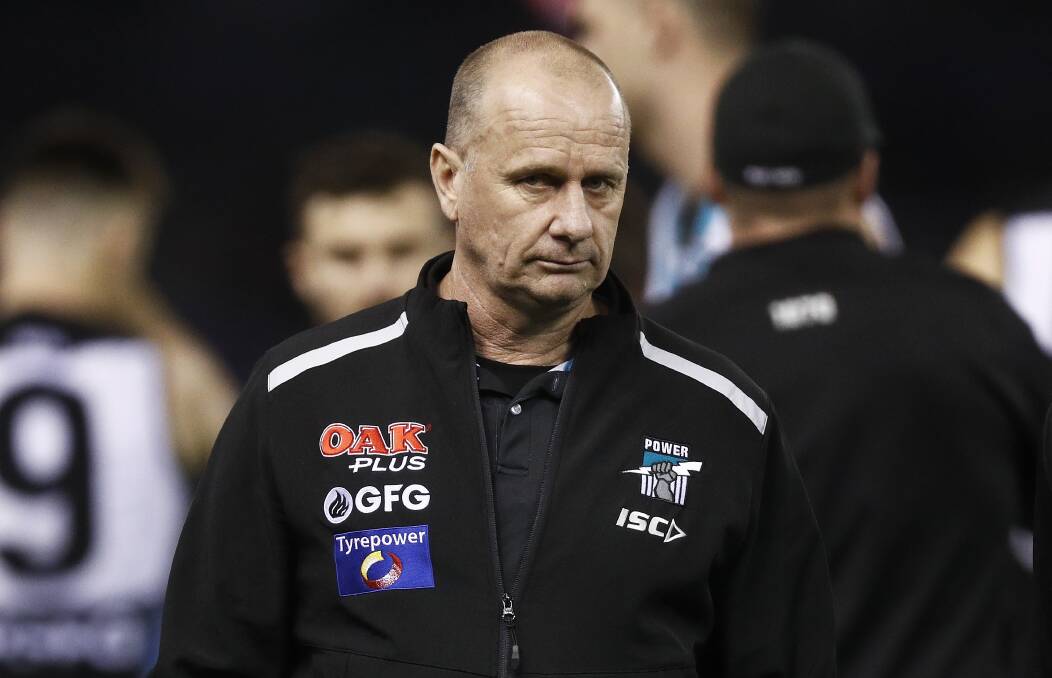 Time to perform: Port Adelaide coach Ken Hinkley after the the round 22 flogging at the hands of the Kangaroos.