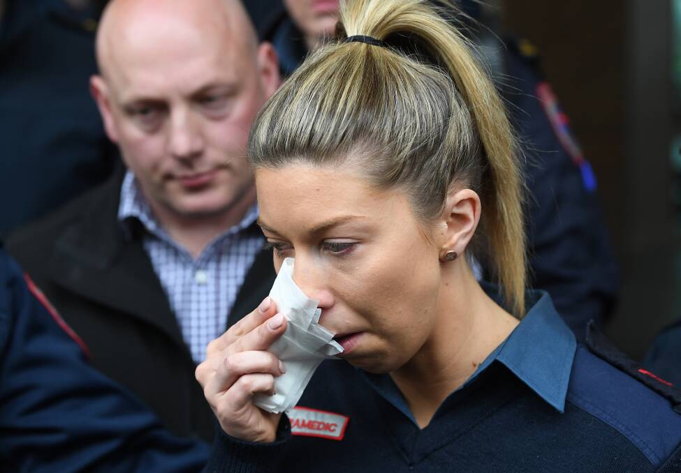 The victim is seen outside the Melbourne Magistrates Court. Picture: AAP Image/Julian Smith