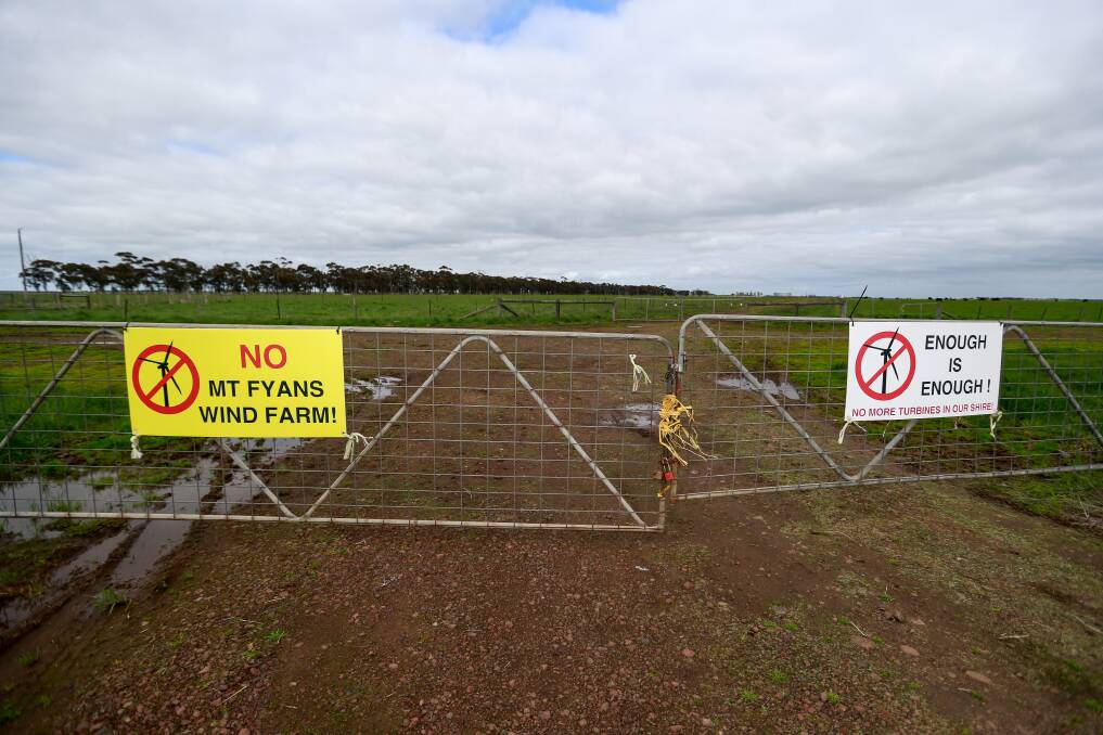 LOCAL OPPOSITION: Signs on a property near Mortlake. Cr Jim Doukas said the Mt Fyans wind farm had encountered strong opposition. Picture: Anthony Brady