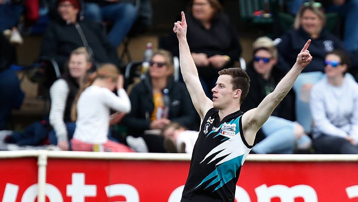 TO THE NEXT GOAL: Kolora-Noorat's Ben Reid celebrates his goal during the second quarter. The Power will now face Nirranda in the grand final. Picture: Mark Witte