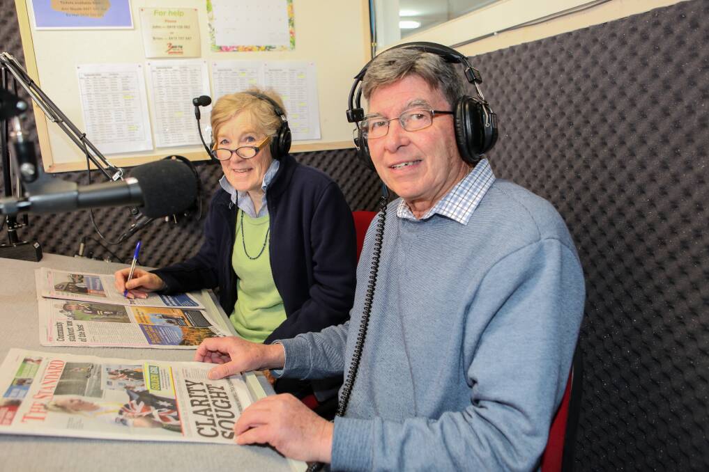 TUNE IN: 3WAY FM community volunteers Chris Cussen and Mal O'Toole are reading out the news from The Standard. Picture: Anthony Brady