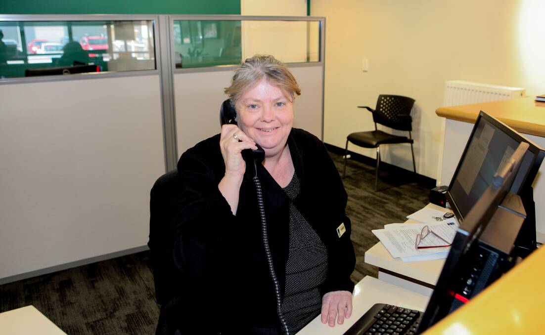 ENGAGED: Moyne Shire Council customer service team member Dianne McNamara and her workmates have been busy on the phone. Picture: Anthony Brady