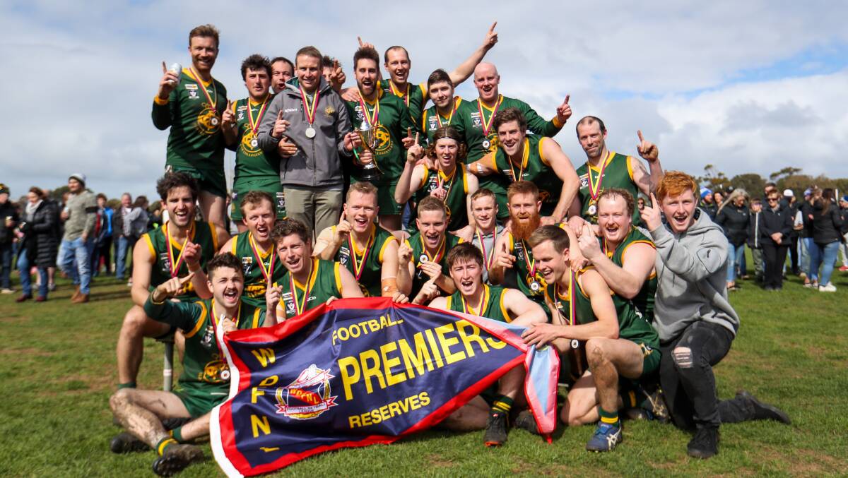 WINNERS: Old Collegians players celebrate their second premiership victory in three seasons. Picture: Morgan Hancock