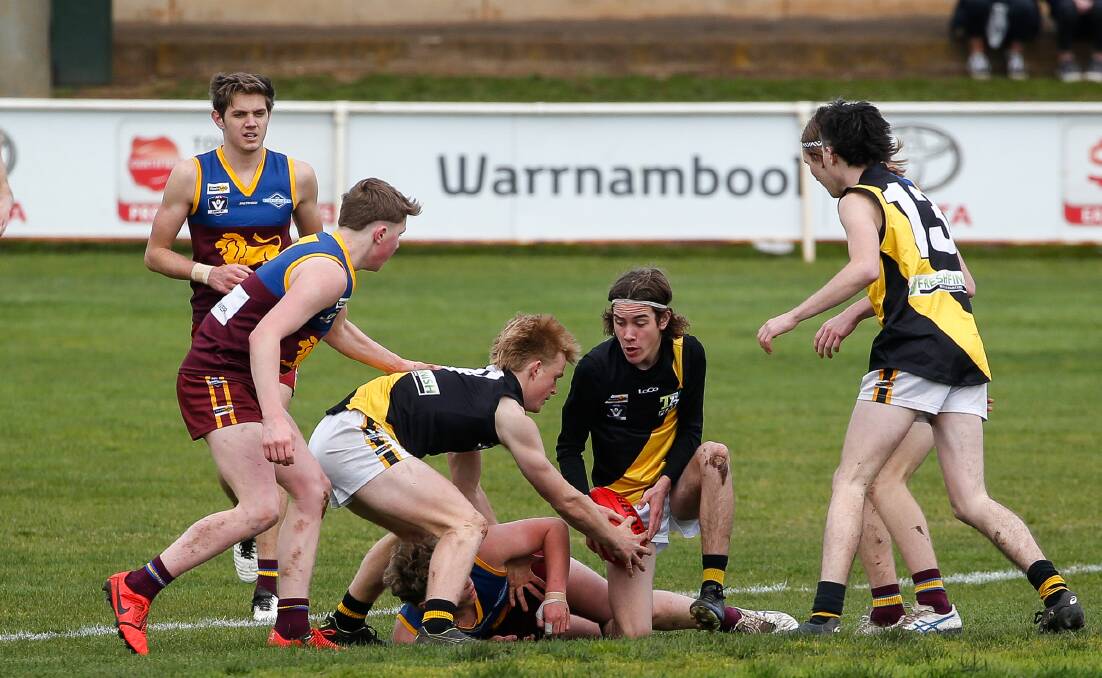 Out: Merrivale's Tate Porter and Jack Walsh hunt the ball during the WDFNL under 18 grand final in 2019. The Tigers have withdrawn from the WDFNL's 2020 junior competitions. Picture: Anthony Brady