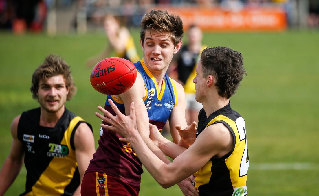 South Rovers Jack Dowd and Merrivale's Tyler Stephens during the WDFNL under 18 grand final. Picture: Anthony Brady