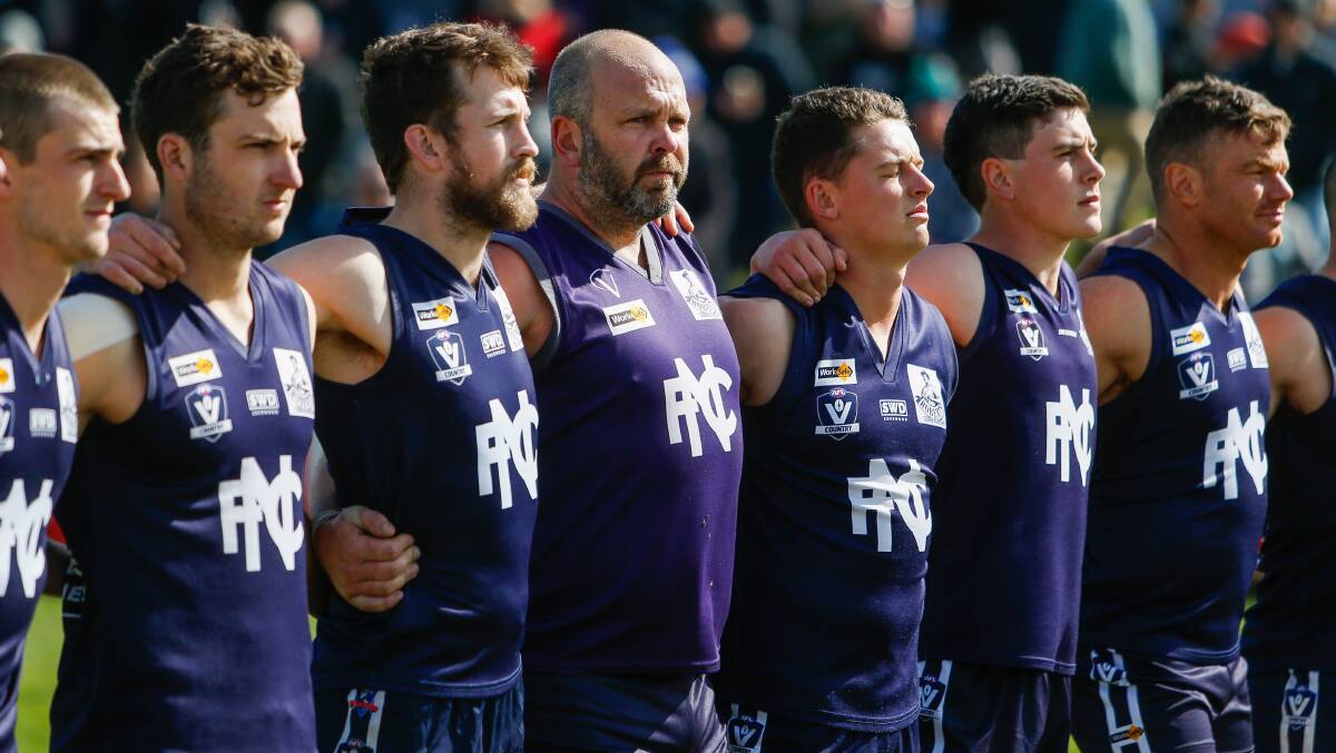 Nirranda players line up for the national anthem in the 2019 grand final. Picture: Morgan Hancock
