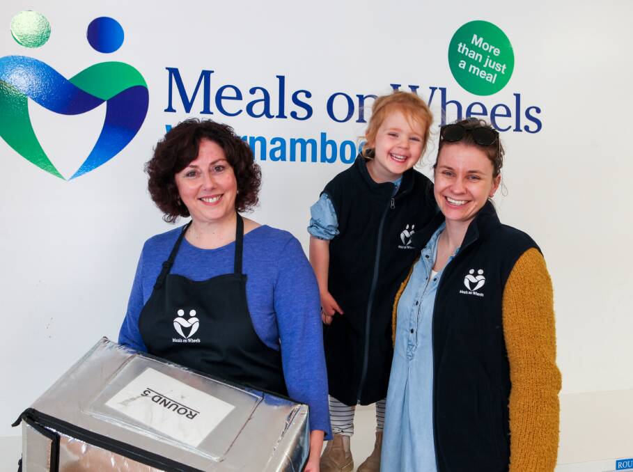 Drivers needed: Warrnambool Meals on Wheels coordinator Cecily Lindsey with volunteers Odetta Hart, 3, and Amelia Webb from Warrnambool. Pictures: Rob Gunstone