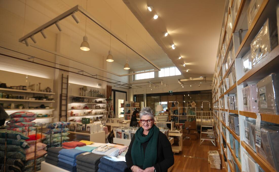 DESIGN: Bed Bath N' Table have found an old ceiling once belonging to a Coles store in the 1940s in the roof. They've used the feature in their new store. Pictured is Deb Harris. Picture: Morgan Hancock