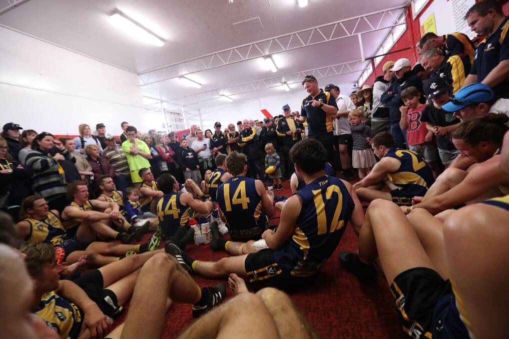 LISTEN UP: North Warrnambool Eagles' coach Adam Dowie speaks to the players after the game. The Eagles had a huge supporter base at the preliminary final. Picture: Mark Witte