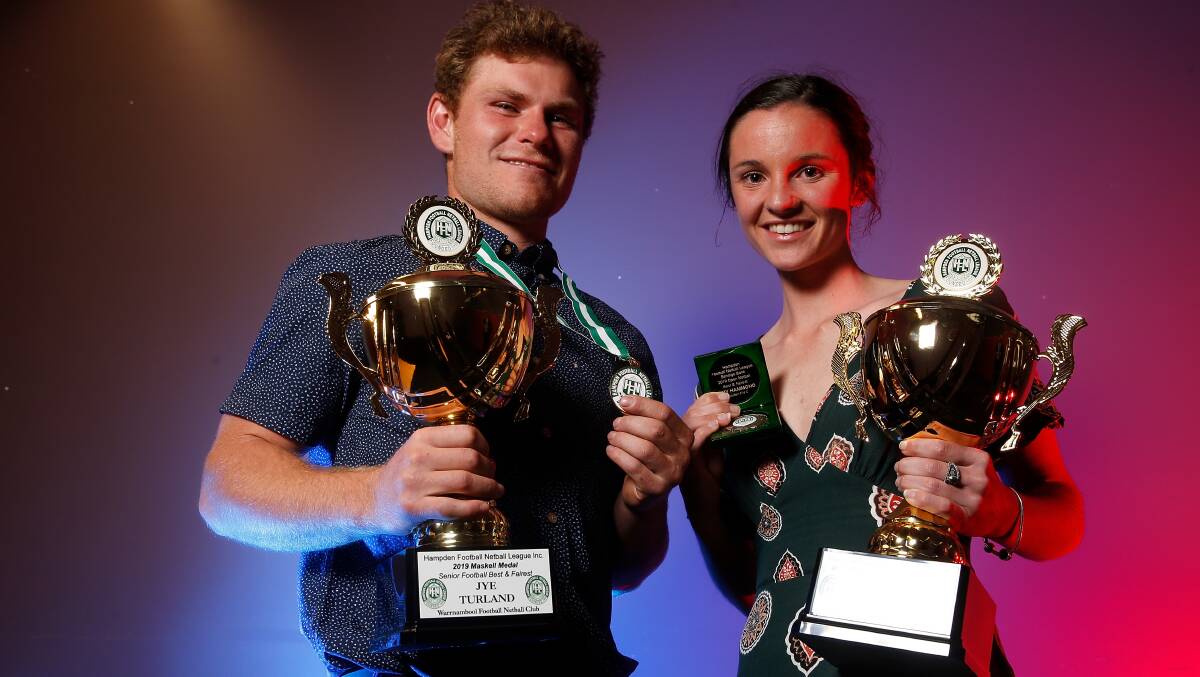 PARTY TIME: Maskell Medal winner Jye Turland, of Warrnambool, and open netball best and fairest Amy Hammond, of Cobden. Picture: Mark Witte