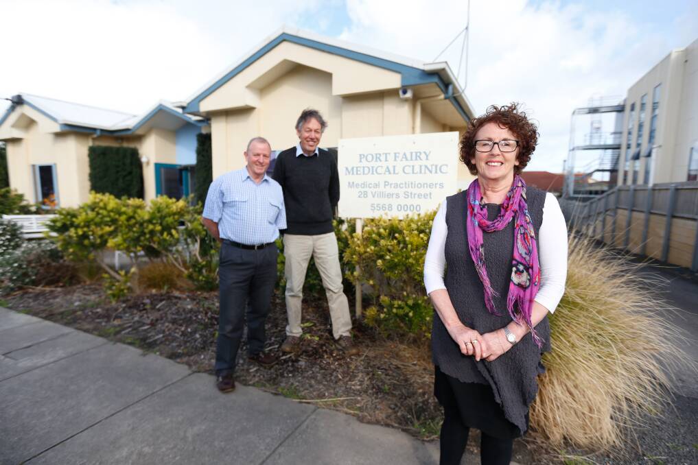A COUNTRY PRACTICE: Dr Ian Sutherland, Dr Andrew Gault stand with Receptionist Jennie Ciavola outside Port Fairy Medical Clinic. Picture: Mark Witte