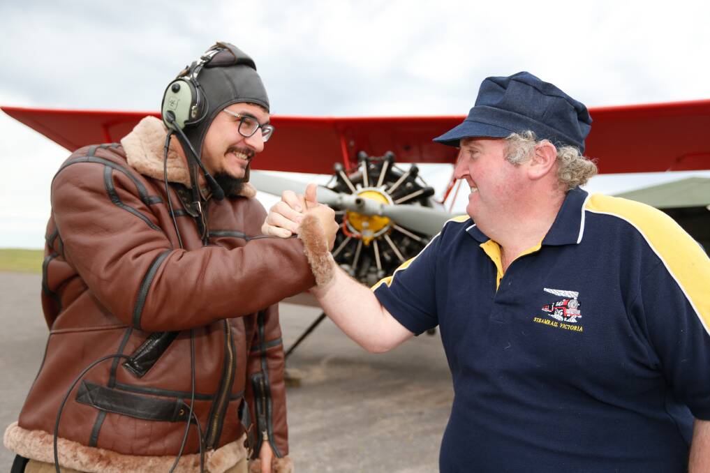 ALL ABOARD: Adventure Flight Co Pilot Jordan Koursaris and train enthusiast and driver Eddie White ahead of the race from Camperdown to Allansford between the plane and steam train. Picture: Mark Witte