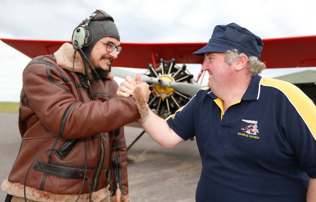 Adventure Flight Co pilot Jordan Koursaris and train enthusist Eddie White ahead of the race from Camperdown to Allansford between the plane and steam train. Picture: Mark Witte