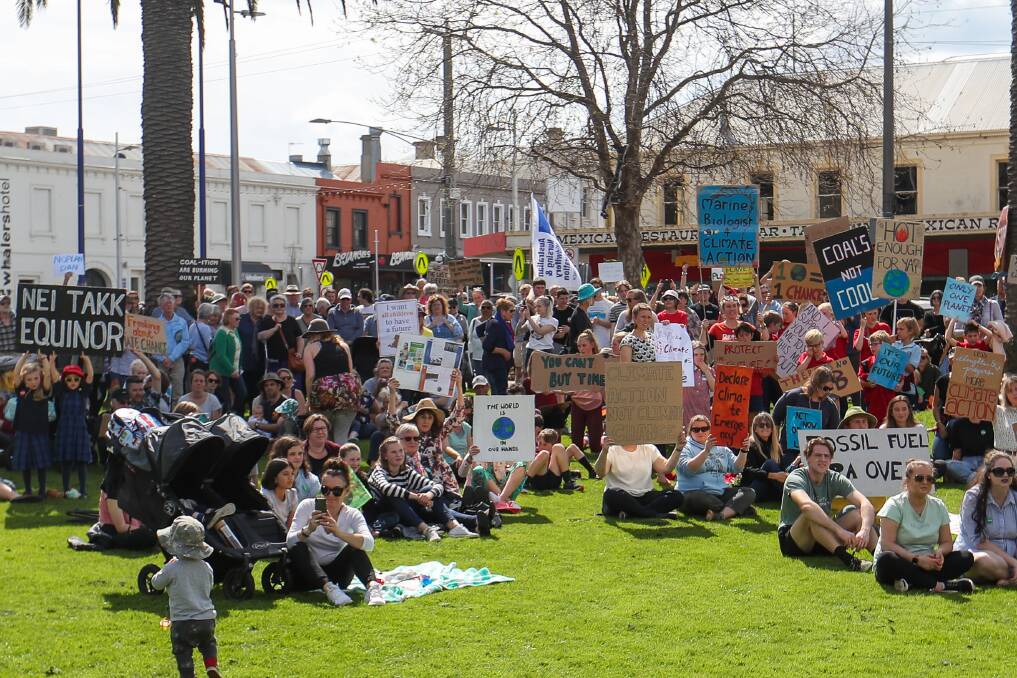 Strike: Crowds flocked to the Civic Green in Warrnambool to show their support for the global strike for Climate Change. Picture: Morgan Hancock