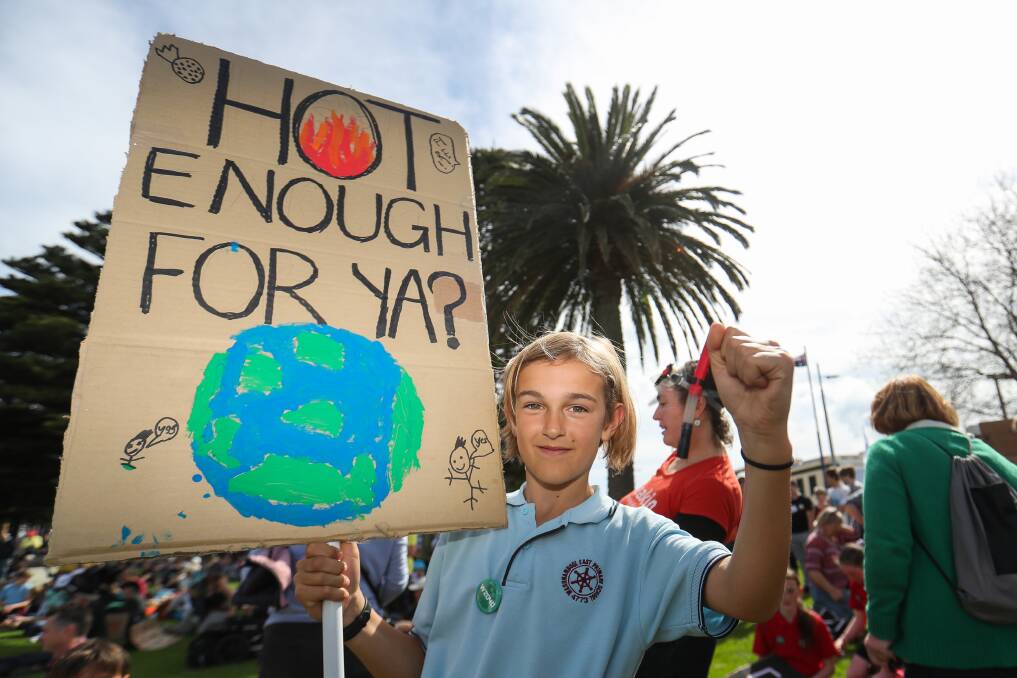 Striking for change: Jarrah Crabbnor, 10, displays his sign at the climate strike. Picture: Morgan Hancock