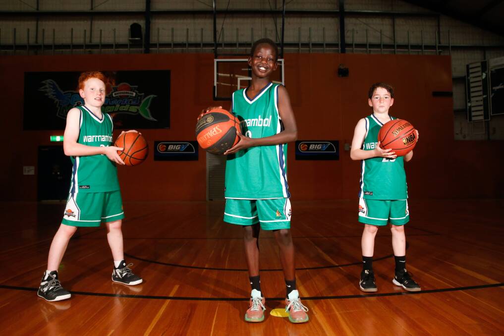 All set: (l-r) Warrnambool basketballers Jimmy Stevens, 9, Mali Lual,10 and Ethan Debono, 10 ahead of the 3x3 Street Hustle event coming to Warrnambool. Picture: Mark Witte