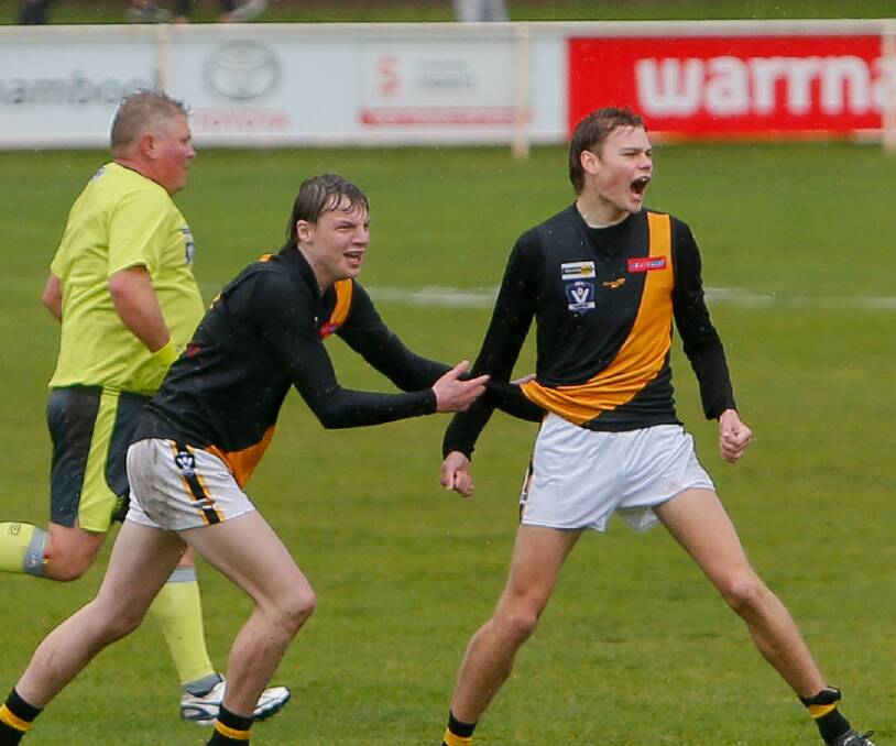 ROARING: Portland under 18.5 players Jed Saunders and Joshua Stiles celebrate a goal. Picture: Anthony Brady