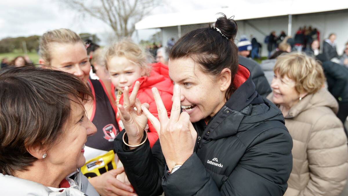 Ecstatic: Koroit coach Stacey O'Sullivan indicates winning three flags in a row after 2019 open grade success. Picture: Mark Witte