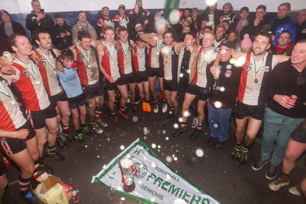 THE TEAM WE LOVE SO DEAR: Koroit players belt out the song after their thrilling grand final win over North Warrnambool Eagles. Picture: Morgan Hancock