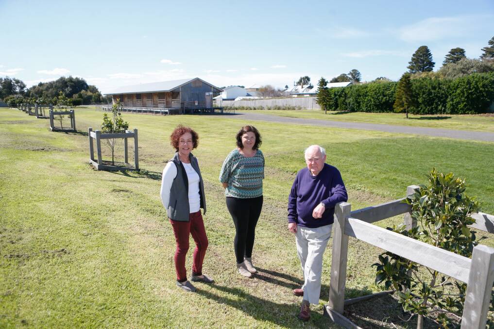 HELPING HAND: Market co-ordinator Pam McGoldrick, centre, with committee members Jo Levey and Morgan McAlinden will organise some stalls at the folk festival. Picture: Mark Witte